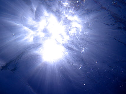 below, beneath, blue, deep, dive, diving, light, ocean, scuba, sea, sun, surface, under, underwater, water, sky, low angle view, sunlight, nature, sunbeam, beauty in nature, no people, cloud - sky, backgrounds, lens flare, day, bright, outdoors, tranquility, full frame, space, light - natural phenomenon, scenics - nature, directly below, solar flare, brightly lit, 4K, CC0, public domain, royalty free