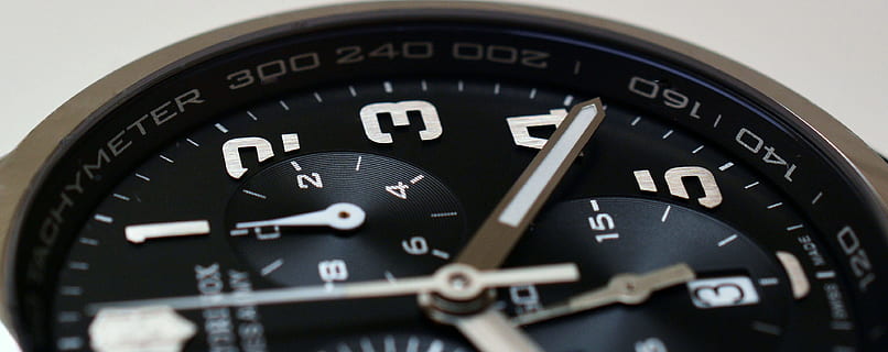 round silver-colored analog, watch, chronograph, clock, control, counter, dial, display, equipment, fast, hours, indoors, instrument, number, precision, technology, time, wristwatch, close-up, clock face, minute hand, clock hand, black color, no people, accuracy, extreme close-up, studio shot, macro, selective focus, full frame, hour hand, instrument of time, black background, personal accessory, silver colored, 4K
