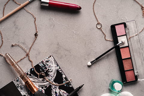 beauty products photo, Flatlay, Makeup, Accessories, Beauty, Cosmetics, still life, high angle view, table, no people, indoors, jewelry, necklace, scissors, equipment, personal accessory, fashion, metal, close-up, make-up, book, directly above, publication, group of objects, key, creativity, 4K, CC0, public domain, royalty free