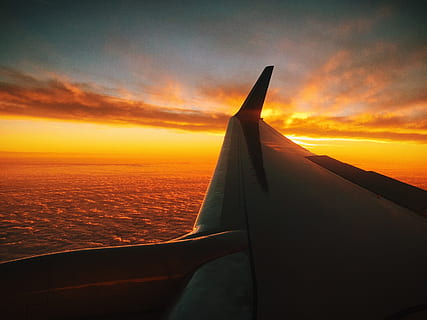 window plane photography, sunset, clouds, flight, flying, plane, sunrise, wings, airplane, air vehicle, mode of transportation, sky, transportation, cloud - sky, aircraft wing, travel, journey, nature, beauty in nature, scenics - nature, no people, orange color, mid-air, sea, water, aerial view, outdoors, aerospace industry, 720P, CC0, public domain, royalty free