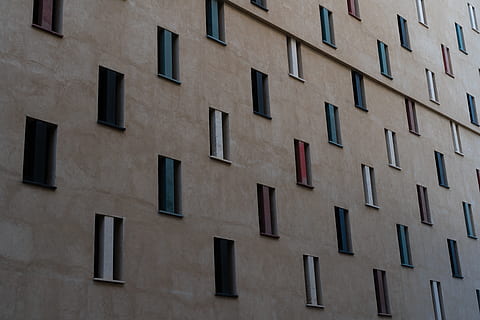 assorted-color building windows, exterior, building, less is more, functionalism, architecture, full frame, built structure, building exterior, window, backgrounds, low angle view, no people, pattern, in a row, day, repetition, side by side, outdoors, design, wall - building feature, city, brown, residential district, apartment, electrical equipment, 5K, CC0, public domain, royalty free