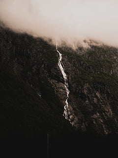 black, mountain, clouds, nature, outdoors, weather, norway, trollstigen, cliff, fog, mist, olympus, river, water, waterfall, plateau, slope, landslide, slate, scenery, wilderness, mountain range, beauty in nature, no people, scenics - nature, sky, tranquility, rock, environment, tranquil scene, land, day, non-urban scene, rock - object, geology, landscape, rock formation, solid, motion, power in nature, formation, 4K, CC0, public domain, royalty free