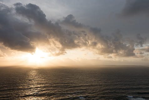 sunset, clouds, water, waves, cliffs, shore, explosion, rays, sun, sunrise, calm, wind, reflection, wide, sea, dark, sky, scenics - nature, cloud - sky, beauty in nature, horizon over water, tranquility, horizon, tranquil scene, waterfront, nature, no people, idyllic, sunlight, non-urban scene, seascape, 4K, CC0, public domain, royalty free