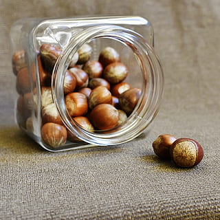 hazelnuts, jar, healthy nuts, nut, vitamins, dieting, vegetarian, brown, nutrition, delicious, tasty, snacks, vegan, vitamins source, essential food, gaining weight, gain, weight, fitness, source of protein, healthy, hazelnut fruit, food, food and drink, container, healthy eating, wellbeing, still life, freshness, indoors, no people, glass - material, close-up, table, transparent, nut - food, chestnut - food, high angle view, large group of objects, snack, airtight, 4K, CC0, public domain, royalty free