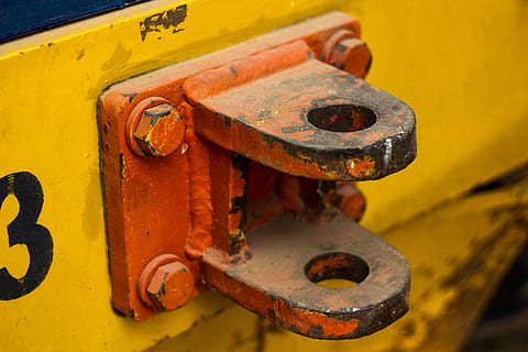 socket, yellow, orange, orange socket, bolted, metal, rusty, close-up, old, weathered, run-down, decline, no people, obsolete, abandoned, damaged, lock, deterioration, focus on foreground, machinery, day, strength, safety, security, iron - metal, latch, 4K, CC0, public domain, royalty free