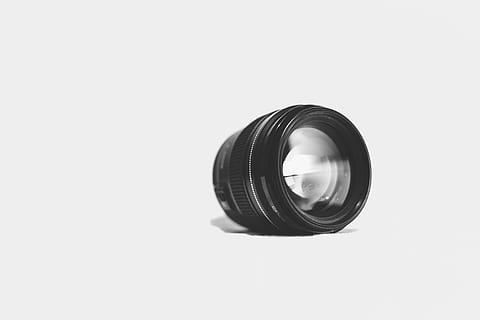 young, man, holding, vinyl, lens - optical instrument, photography themes, technology, camera - photographic equipment, photographic equipment, single object, white background, copy space, glass - material, cut out, close-up, equipment, studio shot, lens - eye, geometric shape, circle, camera, shape, indoors, still life, modern, digital camera, 1080P, CC0, public domain, royalty free