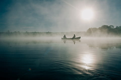 boat, lake, water, canoe, boating, people, fishing, fisherman, sunrise, dawn, fog, foggy, nature, outdoors, reflection, nautical vessel, tranquility, waterfront, sky, scenics - nature, beauty in nature, tranquil scene, mode of transportation, day, transportation, idyllic, sun, sunlight, no people, 5K