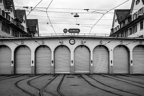 cable train garage, transportation, railway, rail, train track, vehicle, window, tarmac, asphalt, building, urban, sphere, neighborhood, road, curtain, bandw, symmetry, wallpaper, rails, intersection, shutter, architecture, built structure, building exterior, street, city, no people, day, sky, outdoors, lighting equipment, footpath, arch, cable, railroad track, street light, nature, track, 5K, CC0, public domain, royalty free