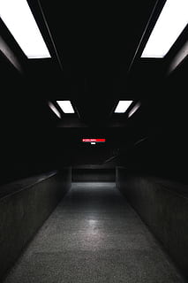 empty pathway, architecture, illuminated, direction, built structure, the way forward, empty, indoors, lighting equipment, no people, transportation, ceiling, tunnel, diminishing perspective, wall - building feature, sign, building, light, public transportation, subway, absence, dark, flooring, underpass, long, 5K, CC0, public domain, royalty free