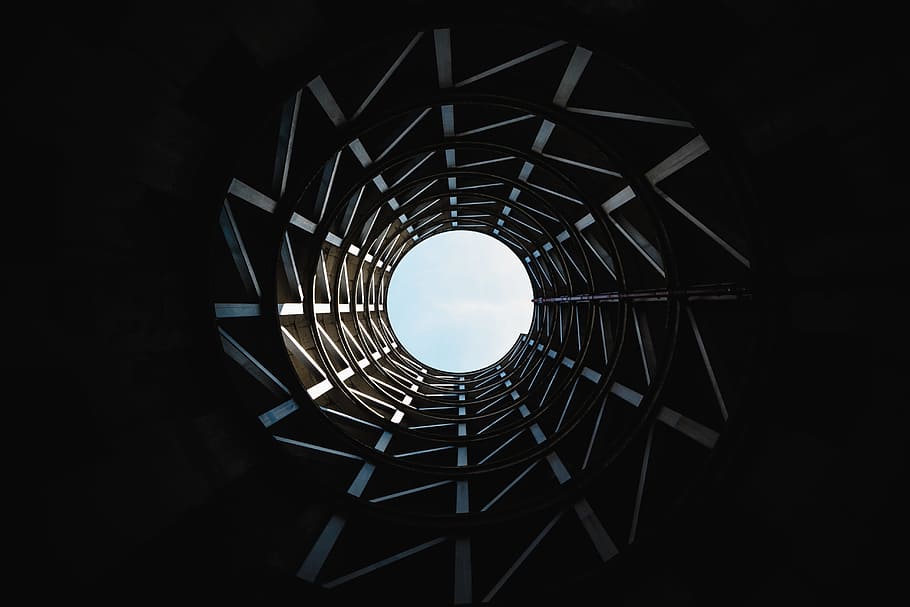 architecture, building, infrastructure, structure, circle, round, clouds, sky, built structure, geometric shape, no people, directly below, shape, pattern, indoors, spiral, staircase, railing, black color, nature, design, spiral staircase, infinity, metal, black background, concentric, 5K