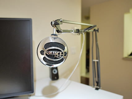 monitor, display, screen, electronics, headphones, headset, lcd screen, home decor, clinic, indoors, table, furniture, shelf, trademark, logo, symbol, pc, computer, room, electrical device, technology, no people, communication, close-up, focus on foreground, microphone, equipment, arts culture and entertainment, metal, music, input device, wireless technology, machinery, connection, still life, portable information device, 4K, CC0, public domain, royalty free