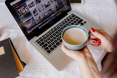 woman works, desk, laptop, cup, coffee, macbook, computer, work, study, home office, office, technology, cappucino, late, workspace, workplace, wireless technology, adult, drink, hand, human hand, mug, connection, food and drink, high angle view, indoors, human body part, communication, one person, coffee cup, women, using laptop, drinking, 5K