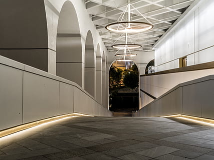 photo, gray, concrete, building, architecture, ceiling, empty, hallway, light, modern, passage, perspective, step, built structure, illuminated, lighting equipment, no people, corridor, indoors, arcade, flooring, wall - building feature, railing, the way forward, glass - material, absence, direction, 8K, CC0, public domain, royalty free