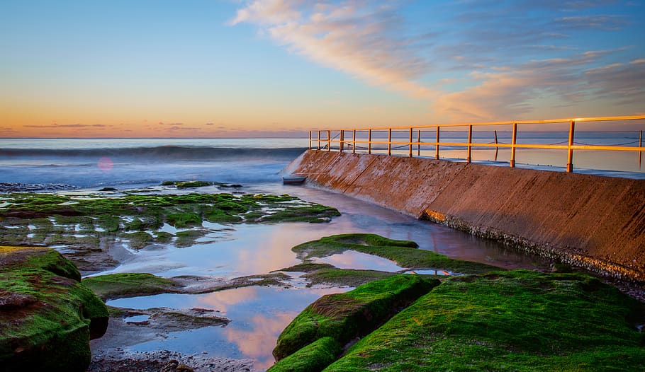 Austràlia, cronulla, cel, aigua, posta de sol, mar, escenics - natura, bellesa a la natura, platja, horitzó sobre l’aigua, escena tranquil·la, naturalesa, terra, tranquil·litat, cap gent, núvol - cel, color taronja, horitzó, idíl·lic, planta, moviment, 4K