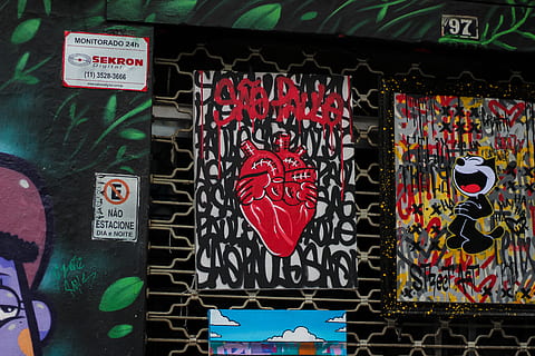 two assorted-color paintings, art, graffiti, canvas, heart, text, label, street art, artwork, pop, street, closeup, urban, color, dark, sao paulo, drawing, clothing, apparel, colors, frame, communication, western script, retail, no people, market, day, script, for sale, non-western script, outdoors, market stall, variation, choice, multi colored, information, retail display, large group of objects, heart shape, art and craft, 5K, CC0, public domain, royalty free
