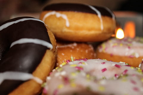 assorted doughnuts, food and drink, food, selective focus, close-up, freshness, indoors, unhealthy eating, ready-to-eat, indulgence, one person, sweet food, focus on foreground, baked, dessert, bread, sweet, studio shot, celebration, temptation, snack, 4K, CC0, public domain, royalty free