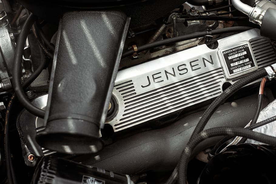 grauer jensen Motor, Motor, Motor-, Maschine, Genf, Schweiz, Transport, Fahrzeug, Fahrrad, Spule, Rotor, Spiral-, Jensen, Auto Motor, Autos, Auto, Automobil, Autoshow, Produktdesign, Landfahrzeug, Metall, Transportmittel, Nahansicht, Kraftfahrzeug, keine Leute, Retro-Stil, Text, verlassen, Tag, alt, Kommunikation, draußen, Fahrzeugteil, heruntergewirtschaftet, Scheinwerfer, 5K
