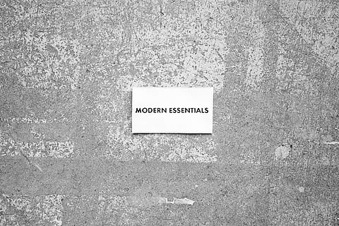 modern essentials, communication, text, western script, wall - building feature, no people, sign, day, built structure, information, textured, close-up, architecture, outdoors, wall, script, non-western script, paper, information sign, directly above, white color, message, concrete, 5K, CC0, public domain, royalty free