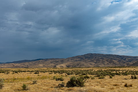 scenic, view, mountains, 4k wallpaper, cloudiness, clouds, cloudy, environment, field, grass field, grassland, HD wallpaper, landscape, mountain, nature, overcast, pasture, scenery, sky, cloud - sky, scenics - nature, beauty in nature, tranquil scene, non-urban scene, tranquility, land, mountain range, no people, day, plant, remote, grass, idyllic, desert, outdoors, arid climate, climate, semi-arid, formation, 5K, CC0, public domain, royalty free