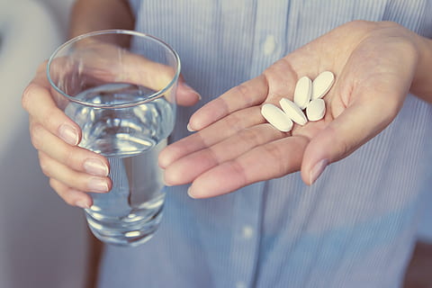 hands, girl, holding, pills, pill, dose, medicine, human hand, human body part, healthcare and medicine, hand, adult, nutritional supplement, close-up, water, drink, glass, taking medicine, household equipment, drinking glass, capsule, people, 5K