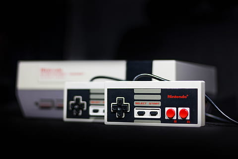 gray, nintendo nes, console, controllers, appliance, electronics, game, game controllers, nes, nintendo, technology, indoors, studio shot, communication, black background, retro styled, focus on foreground, no people, close-up, camera - photographic equipment, arts culture and entertainment, photography themes, text, music, sound recording equipment, equipment, still life, audio equipment, western script, digital camera, electrical equipment, 4K, CC0, public domain, royalty free