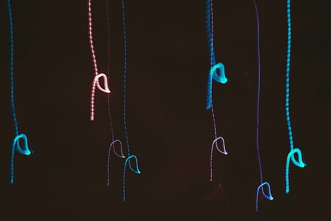 led strings, hanging, no people, indoors, close-up, rope, illuminated, multi colored, red, blue, emotion, thread, string, still life, side by side, studio shot, equipment, glowing, clip, panoramic, black background, 4K, CC0, public domain, royalty free