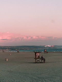 seashore, nature, outdoors, person, human, building, architecture, transportation, vehicle, sky, scenery, banister, handrail, road, steeple, tower, spire, landscape, watercraft, vessel, red sky, beach, sea, water, land, horizon over water, horizon, sunset, beauty in nature, scenics - nature, tranquility, man made structure, lifeguard hut, tranquil scene, cloud - sky, sand, hut, 4K, CC0, public domain, royalty free