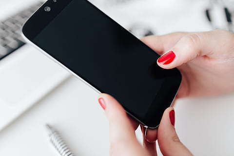 businesswoman, uses, mobile, phone, desk, female, woman, white, office, modern, workspace, workplace, tech, technology, working, business, femine, devices, cellphone, human hand, hand, human body part, holding, adult, women, close-up, one person, nail polish, body part, finger, human finger, red, indoors, nail, connection, red nail polish, communication, beautiful woman, 4K