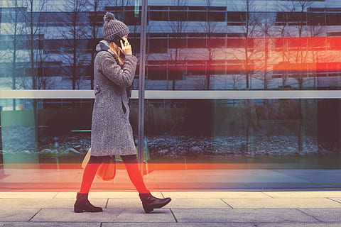 trendy, business woman, goes, calling, smartphone, office center, real people, one person, glass - material, standing, clothing, women, lifestyles, winter, warm clothing, leisure activity, full length, day, adult, built structure, sunlight, nature, outdoors, cold temperature, casual clothing, scarf, 4K, CC0, public domain, royalty free