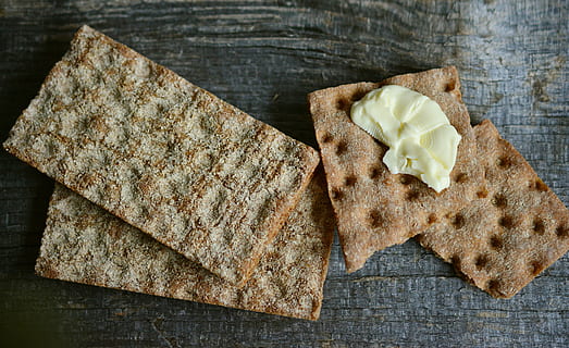 crispbread, bread, crispy, food, crack, baked goods, sweden, bread slices, whole wheat, butter, nutrition, healthy, eat, food and drink, freshness, still life, table, indoors, high angle view, directly above, no people, close-up, wood - material, ready-to-eat, wellbeing, healthy eating, brown, slice, baked, indulgence, dairy product, snack, temptation, 5K, CC0, public domain, royalty free