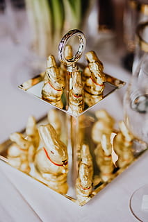 golden, bunnies, tray, table, holidays, table set, chocolate, fancy, easter, table decor, elegance, bunny, lindt, indoors, close-up, food and drink, food, no people, still life, gold colored, freshness, selective focus, focus on foreground, wealth, luxury, indulgence, creativity, large group of objects, high angle view, ready-to-eat, glass - material, transparent, glass, temptation, 2K