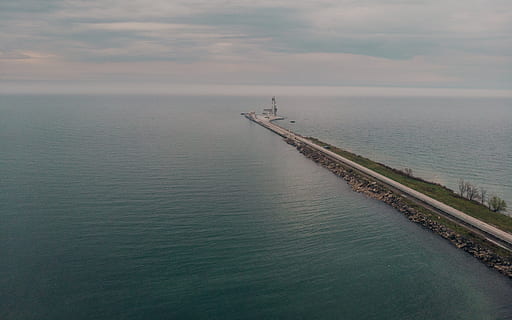 aerial, view, road, leading, large, seaport, horizon, background, machine, shipyard, freight, cargo, sea, bulk, industry, water, terminal, nautical, logistics, maritime, shipment, carrier, device, wharf, vessel, container, industrial, quay, harbor, stevedore, operation, boat, watercraft, waterfront, equipment, quayside, dock, loading, pier, seafaring, export, freighter, machinery, crane, embarkation, ship, shipping, boating, transport, mechanism, seaside, transportation, port, scenics - nature, beauty in nature, nature, no people, tranquility, cloud - sky, high angle view, tranquil scene, outdoors, day, sky, nautical vessel, freight transportation, architecture, 4K